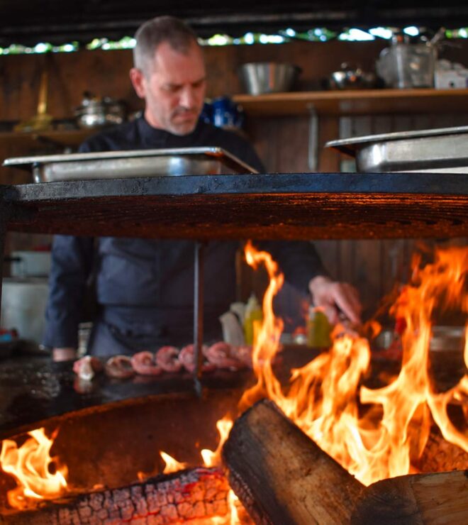 The wood-fired brasero at La Vieille Fontaine restaurant in Maisons-Laffitte, open-air cooking.