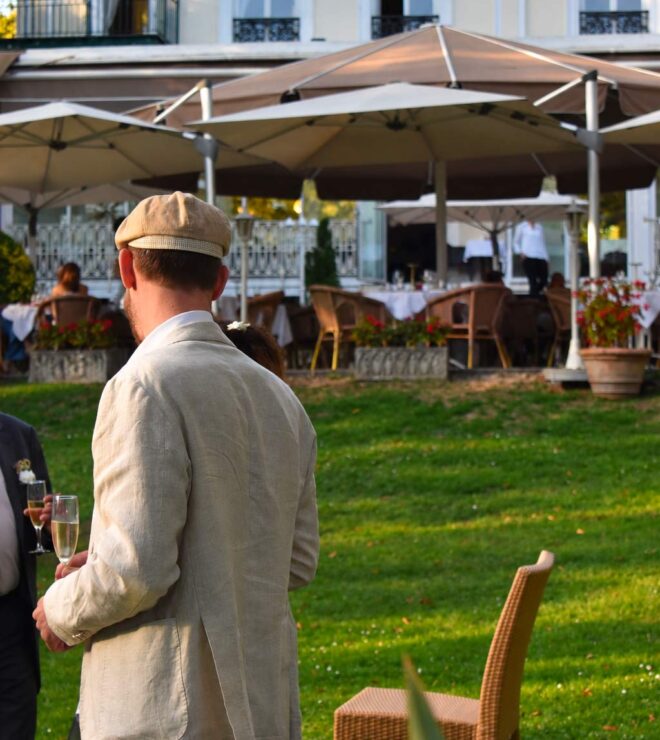 Garden party in the grounds of La Vieille Fontaine restaurant in Maisons-Laffitte, a friendly outdoor reception